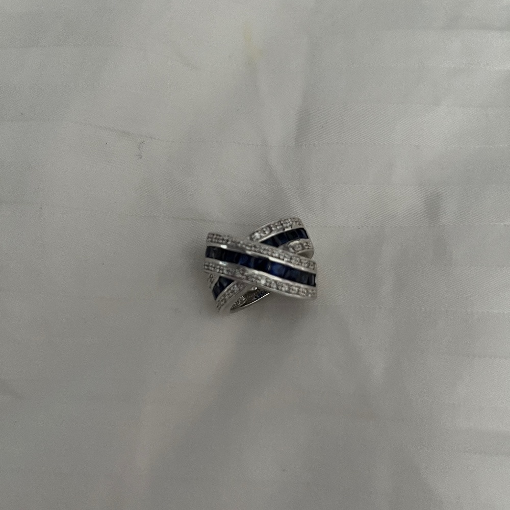 Blue sapphire colored cubic zirconia crisscross ring